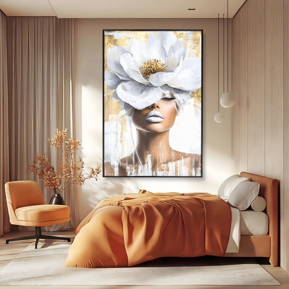 Tablou canvas cu tablou canvas cu portret de femeie si magnolie, in rama de aluminiu negru, pe perete intr-un dormitor